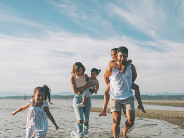 white and grey concrete building near swimming pool under clear sky during daytime